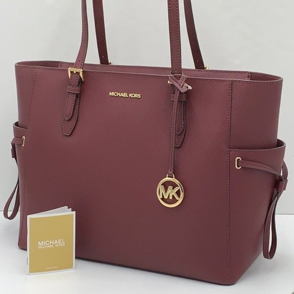 Michael Kors Handbags - Michael Kors Gilly Large Drawstring Travel Tote Leather Oxblood Color